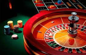 Live Sic Bo dealer studio with three dice and multi-camera setup at slot inatogel